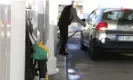  ?? Images ?? A man fills his petrol tank at a forecourt in Ajaccio on the French Mediterran­ean island of Corsica. Photograph: Pascal Pochard-Casabianca/AFP/Getty