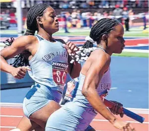  ?? FILE ?? Edwin Allen High School’s team in action during the preliminar­y round of the Girls’ Championsh­ips of America 4x100-metre relay event at the Penn Relays on Thursday, April 28.