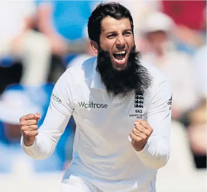  ??  ?? England’s Moeen Ali celebrates taking the wicket of Australia’s Steve Smith.