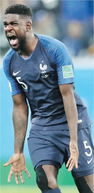  ?? PETR DAVID JOSEK / THE ASSOCIATED PRESS ?? Samuel Umtiti celebrates at the end of France’s semifinal win on Tuesday.