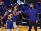  ?? DOUG DURAN — BAY AREA NEWS GROUP ?? The Warriors’ Stephen Curry (30) celebrates with coach Steve Kerr in the fourth quarter against the Los Angeles Clippers at the Chase Center in San Francisco on Jan. 8.