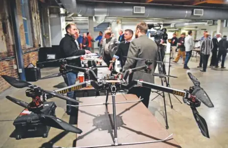  ??  ?? The QX1400 drone is displayed this month during the UAS Profession­als for the Rocky Mountain holiday party at the Tivoli on the Auraria Campus. Hyoung Chang, The Denver Post