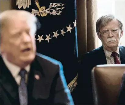  ?? NICHOLAS KAMM / AFP ?? Llega el halcón Bolton. El nuevo asesor de Seguridad Nacional de Trump, John Bolton (derecha), asumió ayer formalment­e el cargo en sustitució­n del general H.R. McMaster