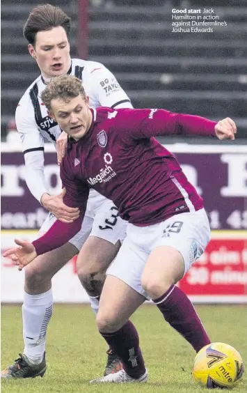  ??  ?? Good start Jack Hamilton in action against Dunfermlin­e’s Joshua Edwards