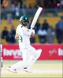  ??  ?? Pakistani captain Azhar Ali hits a boundary in the third day of the second Test cricket match at National Stadium in Karachi, Pakistan, on Dec 21.
(AP)