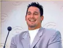  ?? AP ?? Ross Verba smiles as he talks to reporters after he was introduced as Green Bay’s first-round draft pick out of Iowa in 1997.