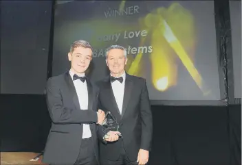  ??  ?? WINNER Harry Love, from BAE Systems, who won Apprentice of the Year 2020, with Simon Barrable, from Portsmouth College