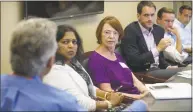  ?? Erik Trautmann / Hearst Connecticu­t Media ?? Jaya Daptardar, CEO of MCCA and an Alzeimers Associatio­n volunteer, Mary Kay Harrity, listen to chair of psychiatry at the Western Connecticu­t Health Network, Chuck Herrick, left, as U.S. Rep. Jim Himes, D-Conn., and U.S. Sen. Chris Murphy, D-Conn., hold a roundtable discussion on healthcare and the Affordable Care Act on Friday at Norwalk Hospital.