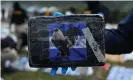  ?? Photograph: Orlando Sierra/AFP/ Getty Images ?? A pack of the seized cocaine with a Honduran flag and an image of a cockerel on the front.