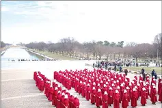  ?? — WP-Bloomberg photos ?? (Above and right) ‘The Handmaid’s Tale’ on location on the National Mall in Washington, D.C., recently.