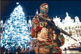  ?? EPA ?? Photo shows a soldier patrolling the Grand Place in Brussels Monday.