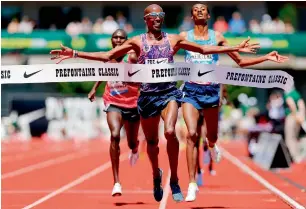  ?? AFP ?? Mo Farah crosses the finish line to win the 5,000m at the 2017 Prefontain­e Classic Diamond League. —