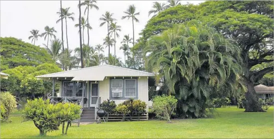  ?? Photograph­s by Meghan Miner ?? THE WAIMEA PLANTATION COTTAGES is a collection of restored workers’ homes that were relocated from three sugar plantation­s in Kauai, Hawaii.