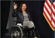  ?? (AP/Paul Beaty) ?? Sen. Tammy Duckworth, D-Ill., waves to supporters during a rally Saturday in Joliet, Ill., ahead of Tuesday’s midterm elections.