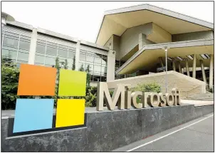  ?? AP ?? Microsoft Corp., whose visitor center in Redmond, Wash., is show in this file photo, says it will pay $7.5 billion in stock for the popular coder hangout GitHub as the maker of Windows further embraces the types of open-source projects it used to shun.