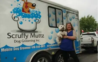  ?? CAROLA VYHNAK PHOTOS FOR THE TORONTO STAR ?? Lindsay Buccella hauls a 16-foot customized trailer equipped with soaker tub, two water tanks, heater, dryer and shop vac for her doggy spa business. “I get waved and honked at,” Buccella says.