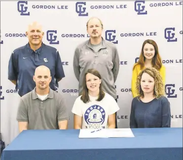  ??  ?? Recent Gordon Lee High School graduate Abby Dalton (seated, center) signed her letter of intent last Tuesday to play basketball for Georgia Northweste­rn. Also on hand for the ceremony was Brad and Candi Dalton. On the back row was Gordon Lee girls’...