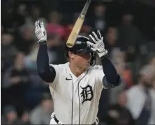  ?? CARLOS OSORIO – THE ASSOCIATED PRESS ?? Spencer Torkelson flips his bat after getting the game-ending hit in the 10th inning of the Tigers' come-from-behind win over the Braves on Monday.