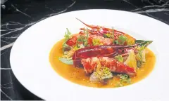  ??  ?? Pomelo salad of char-grilled Carabinero­s Asian prawns from Spain, Asian citron, home-made chilli jam and kapi khoei plankton paste.