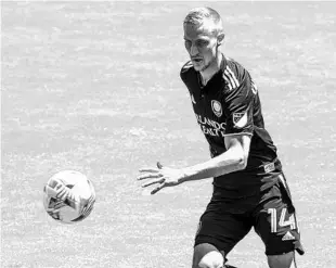  ?? WILLIE J. ALLEN JR./ORLANDO SENTINEL ?? Orlando City Soccer’s Silvester van der Water dribbles the ball during the MLS game against Minnesota United at Exploria Stadium in Orlando on April 9.