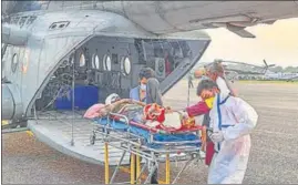 ?? PTI ?? An air force plane lifts a critically injured civilian to Jammu for treatment.