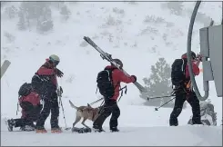  ?? MARK SPONSLER VIA THE ASSOCIATED PRESS ?? Rescue crews work at the scene of Wednesday's avalanche at the Palisades Tahoe resort. “It felt stable,” a skier said about conditions prior to the tragedy.