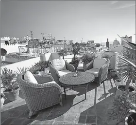  ?? Rick Steves’ Europe/DOMINIC ARIZONA BONUCCELLI ?? User-generated reviews can help you find an authentic, welcoming place in the heart of town — such as this hotel rooftop in Tangier — if you know how to sift through a wide variety of opinions.