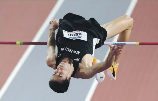  ?? GETTY IMAGES ?? Hamish Kerr leaps to gold at the world indoor championsh­ips in Glasgow in March.