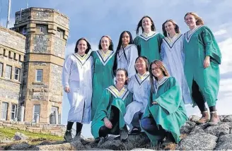  ??  ?? Digby senior girls volleyball team grads on top of Signal Hill in St. John’s, Newfoundla­nd.