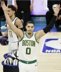  ?? GERRY BROOME/AP ?? BOSTON Celtics Jayson Tatum celebrates winning the NBA All-star skills session basketball contest, Saturday, Feb. 16, 2019, in Charlotte, N.C.