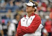  ?? JIM RASSOL / SOUTH FLORIDA SUN SENTINEL ?? Florida Atlantic’s new coach Lane Kiffin insists he’s not interested in looking back as his Owls start practice today.