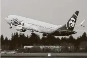  ?? Ted S. Warren / Associated Press ?? The first Alaska Airlines flight of a Boeing 737-9 Max takes off Monday. Boeing says it got more new orders than cancellati­ons for planes in February.