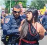  ??  ?? TOP VIDEO Santa Fe protester arrested