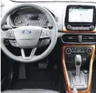  ??  ?? The hatchback’s interior includes a touchscree­n and new technology.