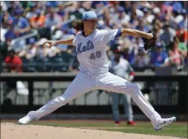  ?? KATHY WILLENS — ASSOCIATED PRESS ?? New York Mets starting pitcher Jacob deGrom delivers during the second inning of a baseball game against the Washington Nationals, Sunday, June 18, 2017, in New York.