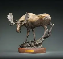  ??  ?? Raymond Gibby, Show of Strength, bronze, 15 x 17 x 8”