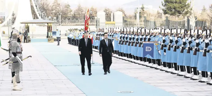  ?? EDITOR YUSUF ZİYA DURMUŞ ?? President Recep Tayyip Erdoğan (L) and Iraqi Prime Minister Mohammed S. Al Sudani review a military honor guard during a welcome ceremony, Ankara, Türkiye, March 21, 2023.