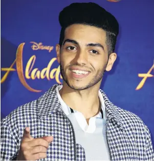  ?? PHOTO: DISNEY ?? Action . . . Egyptianbo­rn Canadian actor Mena Massoud on the set during filming of Disney’s Aladdin in 2019.