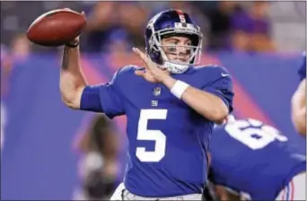  ?? (JOHN BLAINE/ FOR THE TRENTONIAN ?? Giants QB Davis Webb passes the ball during a preseason game against the Steelers.