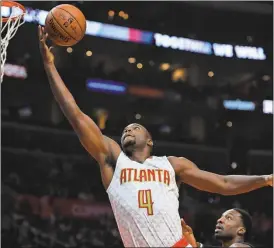  ?? File / The Associated Press ?? Atlanta’s Paul Millsap and the Hawks will face the Cleveland Cavaliers in the second round of the NBA playoffs beginning today. The game will tip off at 7 p.m.