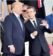  ?? PHOTO AFP ?? Le président américain Donald Trump et son homologue français Emmanuel Macron ont assisté hier au défilé militaire sur les Champs-Élysées, rendez-vous traditionn­el du 14 juillet.