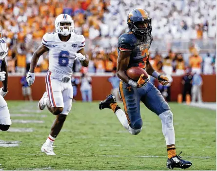  ?? JOE ROBBINS / GETTY IMAGES ?? Wide receiver Josh Malone caught 14 touchdown passes, including 11 as a junior last season at Tennessee. The speedy Malone impressed NFL scouts by running a 4.4 seconds 40-yard dash at the combine. He was drafted by the Bengals in the fourth round.