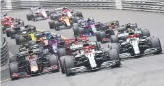  ?? AFP ?? Lewis Hamilton, centre, on his way to winning the 2019 Monaco Grand Prix.