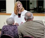  ?? [PHOTO BY SARAH PHIPPS, THE OKLAHOMAN] ?? Taylor Campbell talks with Barbara Vauken and Brian Buswell on Nov. 14 before the Anatomical Donor Service of Appreciati­on and Remembranc­e at the University of Oklahoma College of Medicine in Oklahoma City.