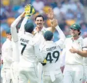  ??  ?? Australia paceman Mitchell Starc celebrates the wicket of Pakistan’s Haris Sohail on the opening day of the first Test in Brisbane on Thursday. GETTY IMAGES