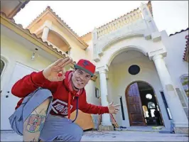  ?? BILL INGRAM / THE PALM BEACH POST ?? Vanilla Ice in front of the Manalapan mansion he renovated as part of the “Vanilla Ice Project” in 2014.