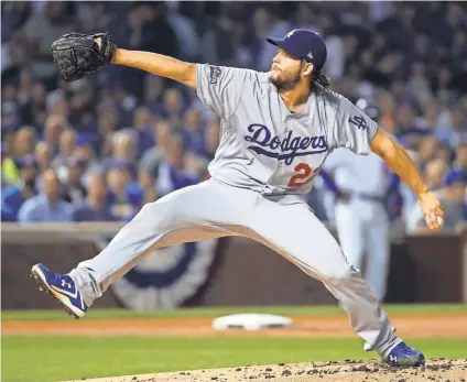  ?? JERRY LAI, USA TODAY SPORTS ?? Dodgers ace Clayton Kershaw is building upon his legend this postseason.