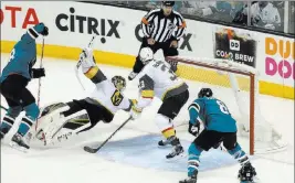  ?? Erik Verduzco ?? Las Vegas Review-journal @Erik_verduzco Traffic at the net is part of hockey and the playoffs, as Knights goalie Marc-andre Fleury shows with a dive for the puck in Game 3 on Monday against San Jose.