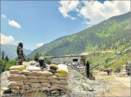  ?? AP ?? Indian soldiers keep guard on the Srinagar- Ladakh highway on June 18, 2020, following the Galwan Valley clash with China across the LAC