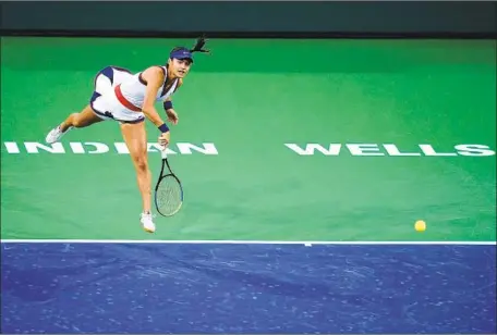  ?? EMMA RADUCANU, Mark J. Terrill Associated Press ?? who would lose in straight sets, serves during her match against Aliaksandr­a Sasnovich at the BNP Paribas Open.